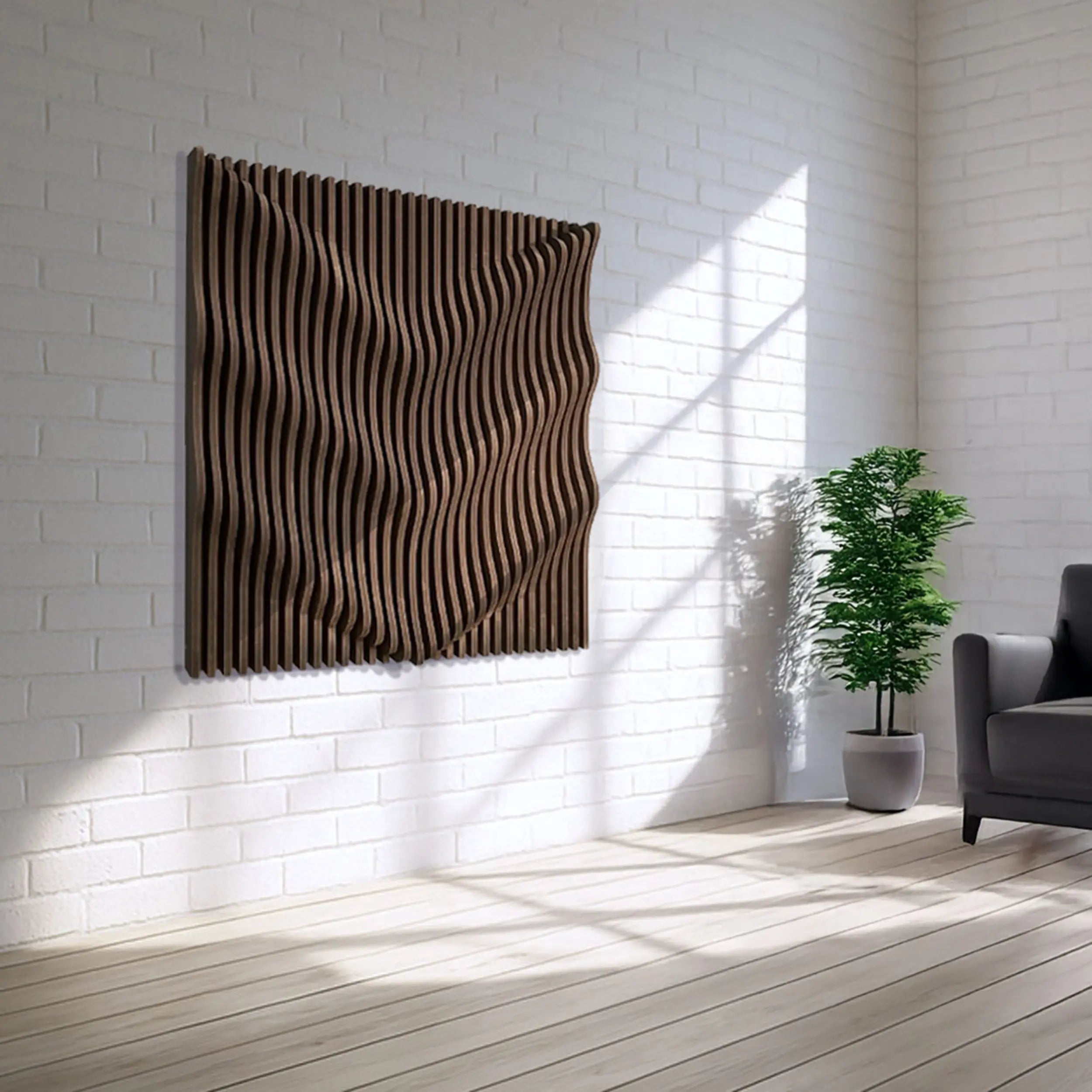 Decorative wall art with wavy pattern on a white brick wall in a room with a plant and chair.